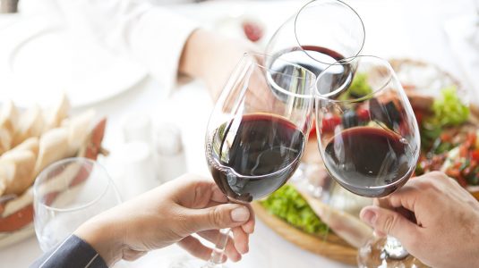 toast with three wine glasses