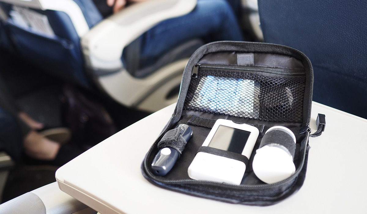 A diabetes blood sugar test kit on a commercial aircraft