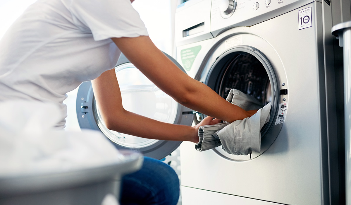 A person doing laundry at home