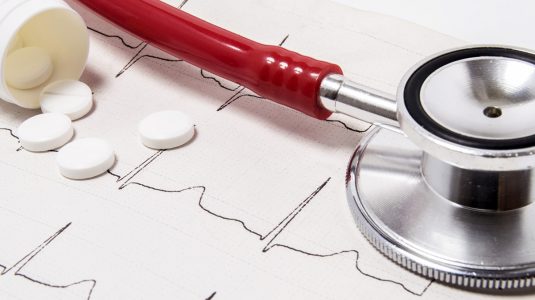 A stethoscope and pills