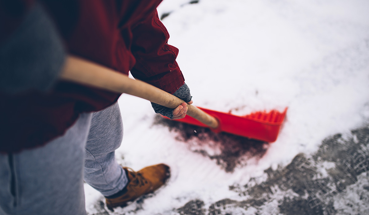 A person shoveling snow