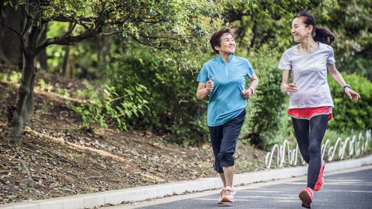 Middle age women running outdoors