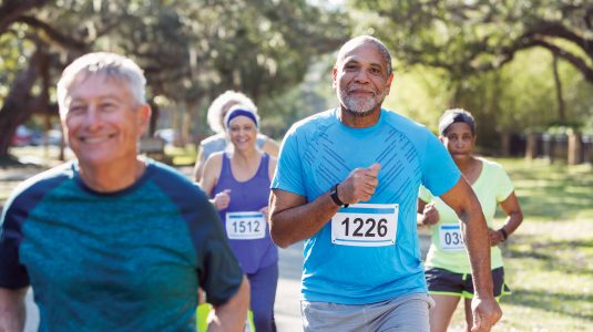 group of people running outdoors