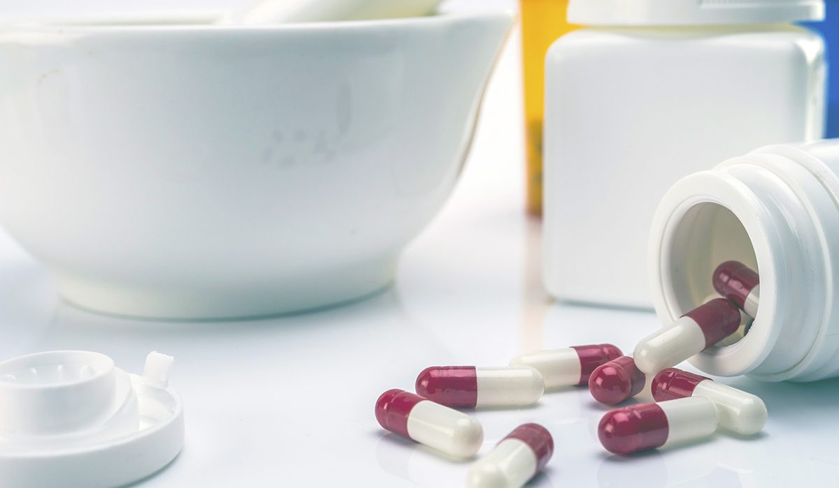 Pills spilled out on a table