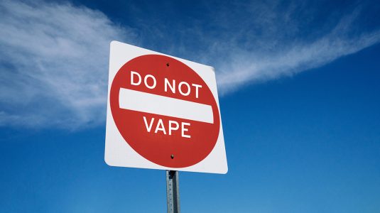 A traffic sign that says do not vape