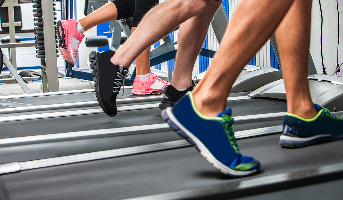 People on treadmills at a gym