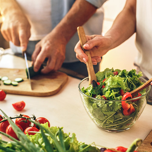Couple cooking together at home