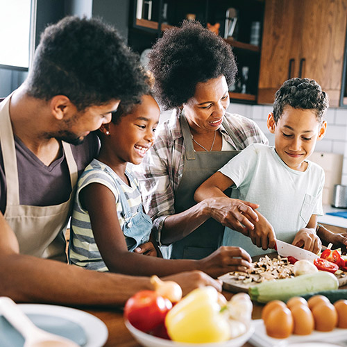 A happy family cooking together