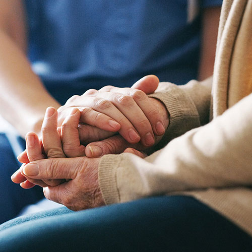 2 people holding hands