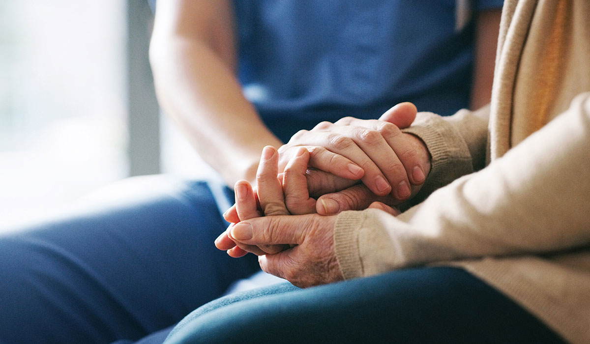 2 people holding hands