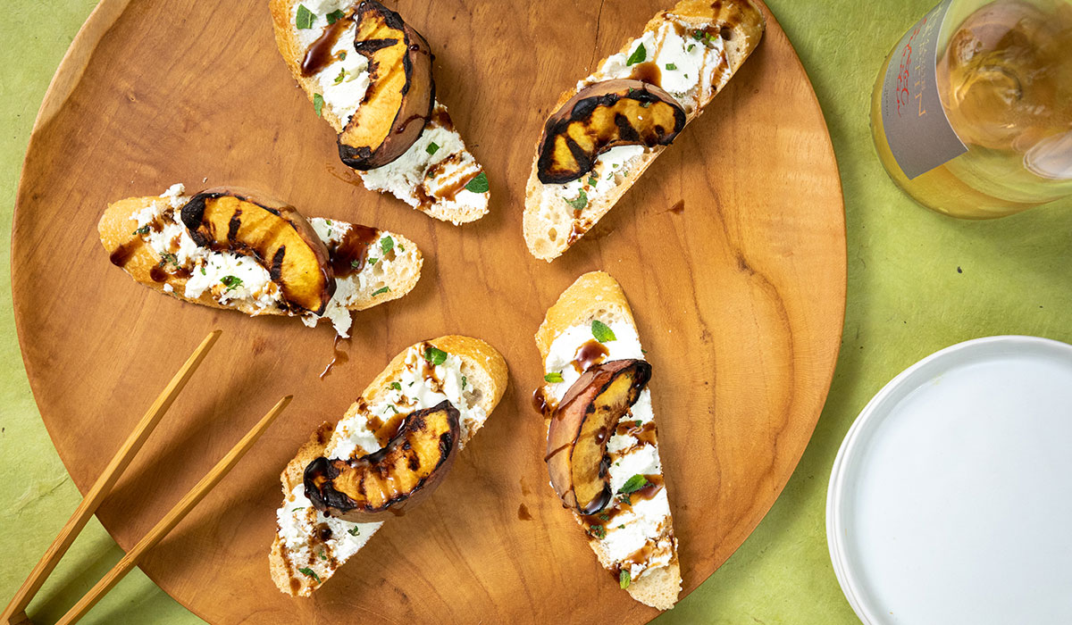 Grilled Peach, Mint, and Goat Cheese Crostinis - Good Neighbor Pharmacy