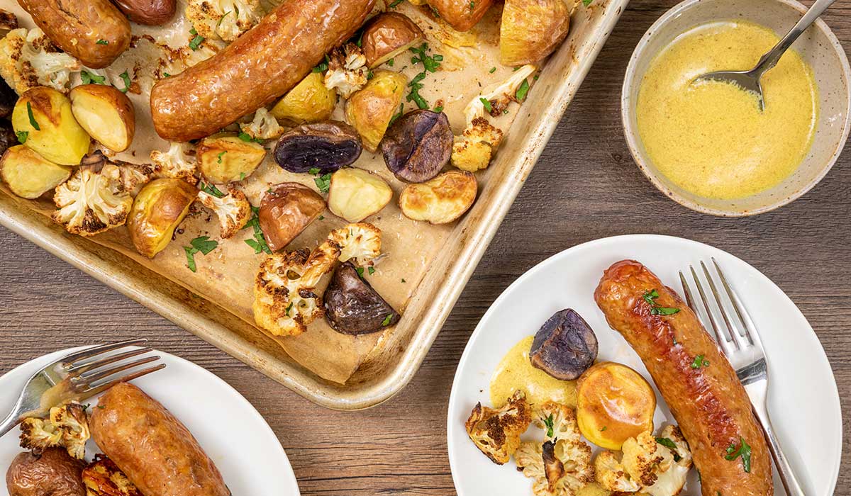 Sheet Pan Sausage, Cauliflower, and Potatoes with Honey-Mustard Sauce - Good Neighbor Pharmacy