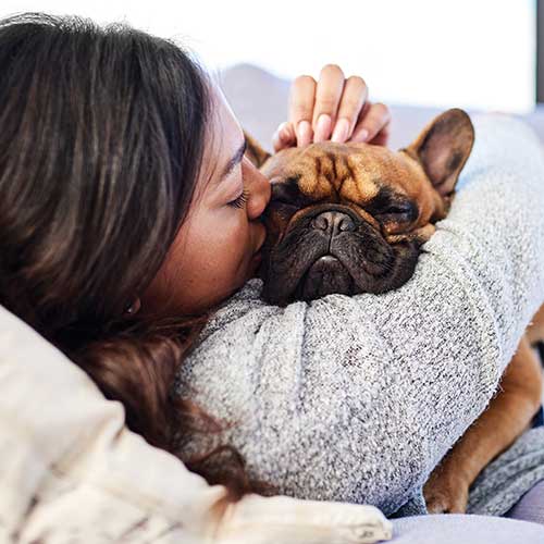 Cuddles with a dog