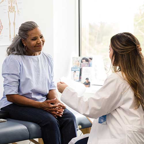 A patient speaking to her doctor